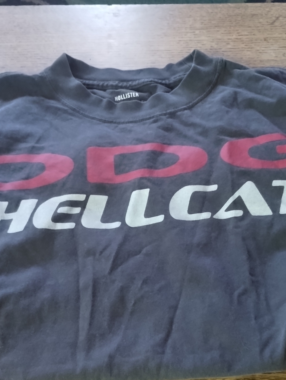 Hollister Black Tee with Red and White Hellcat Graphic